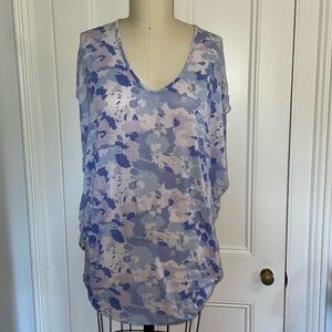 Anthropologie brand beach cover-up. Flattering print and forgiving style.